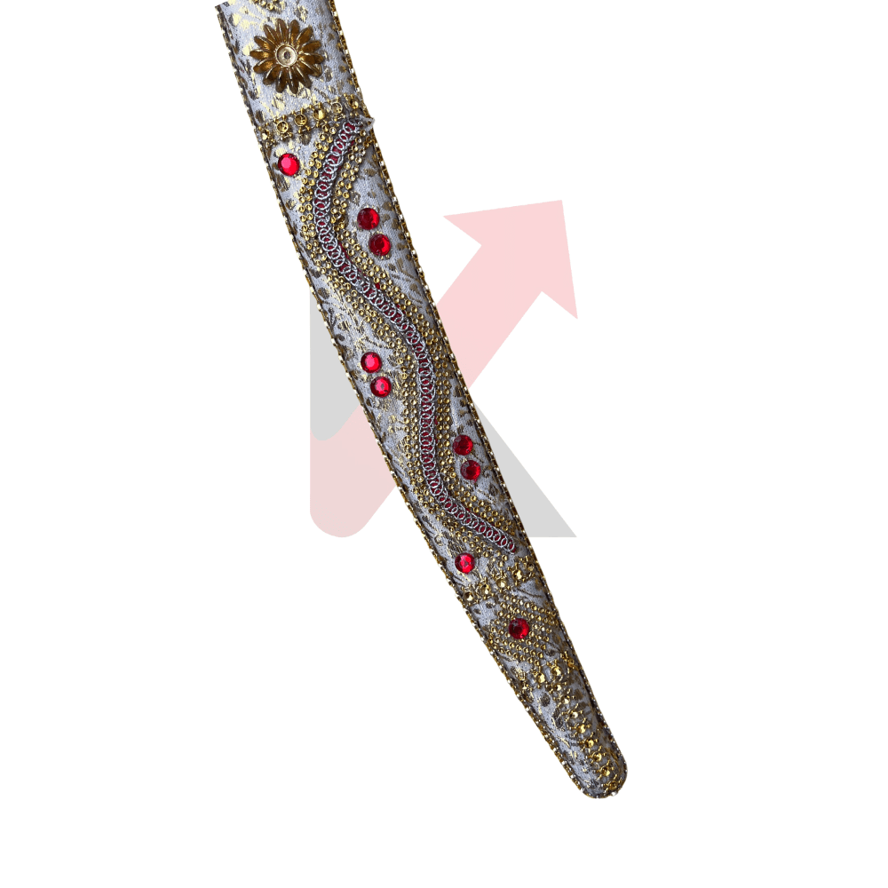 Decorative sword with gold and red embellishments on a white background