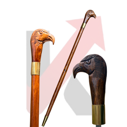 Close-up of handmade eagle carved teak wood walking stick with polished finish