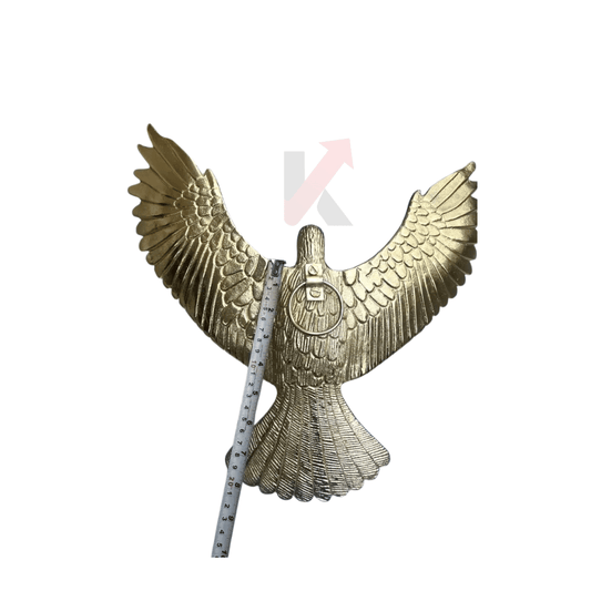 Gold eagle wall art with outstretched wings on display