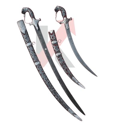 Close-up of Damascus steel blade and engraved silver hilt craftsmanship