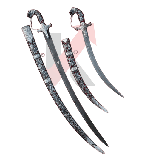 Close-up of Damascus steel blade and engraved silver hilt craftsmanship