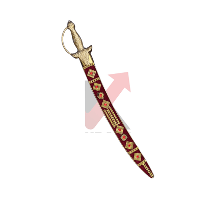 Close view of an Indian brass hilt sword with maroon scabbard, featuring intricate detailing and handcrafted decorative elements.