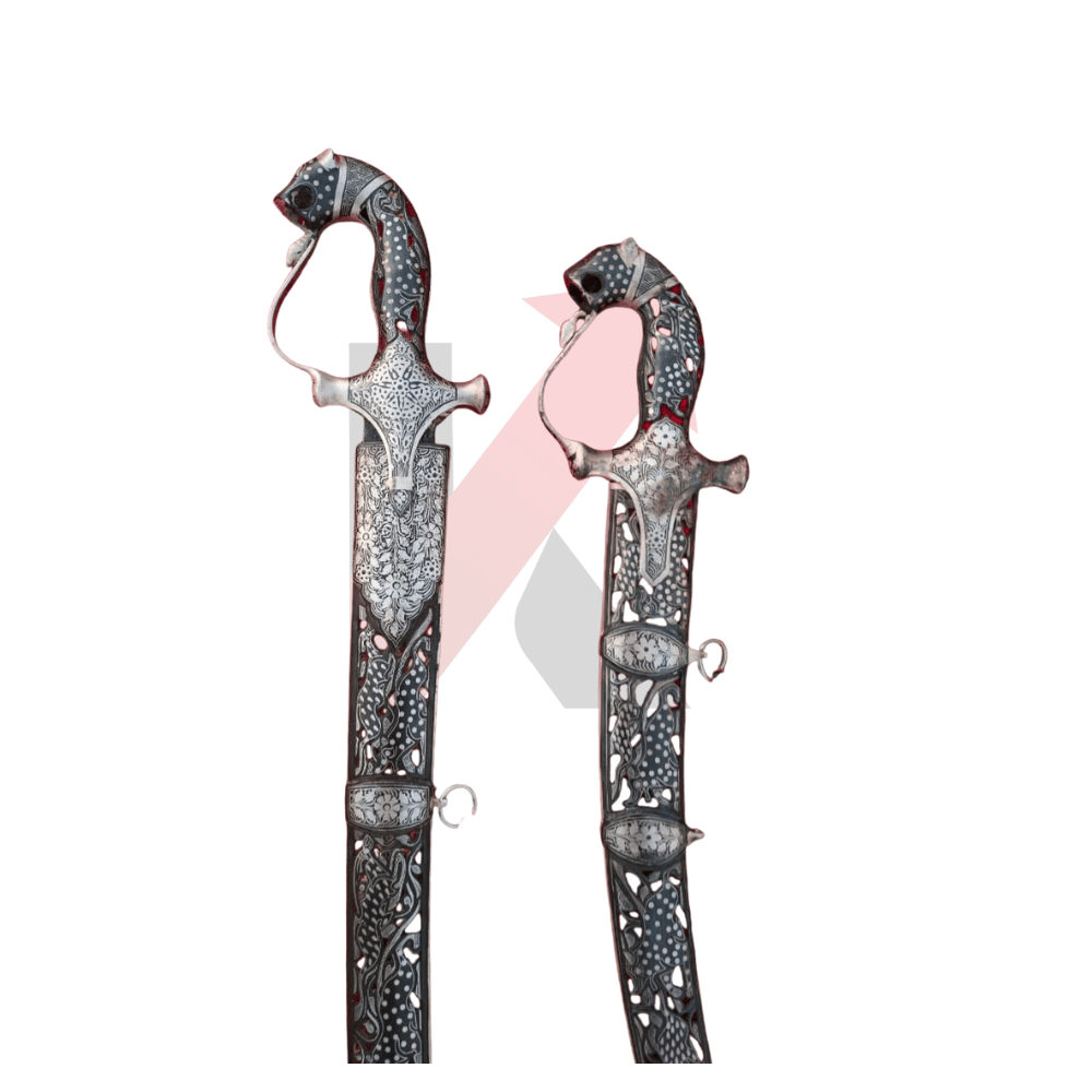 Indian Damascus sword featuring fixed red scabbard inlay and silver details