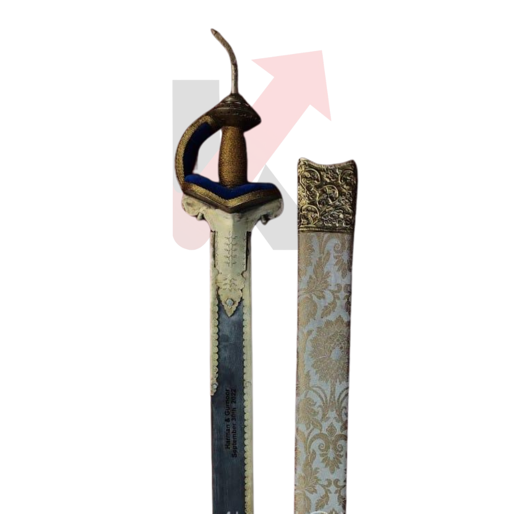 Rajput-style Khanda sword resting in its deep blue velvet scabbard

