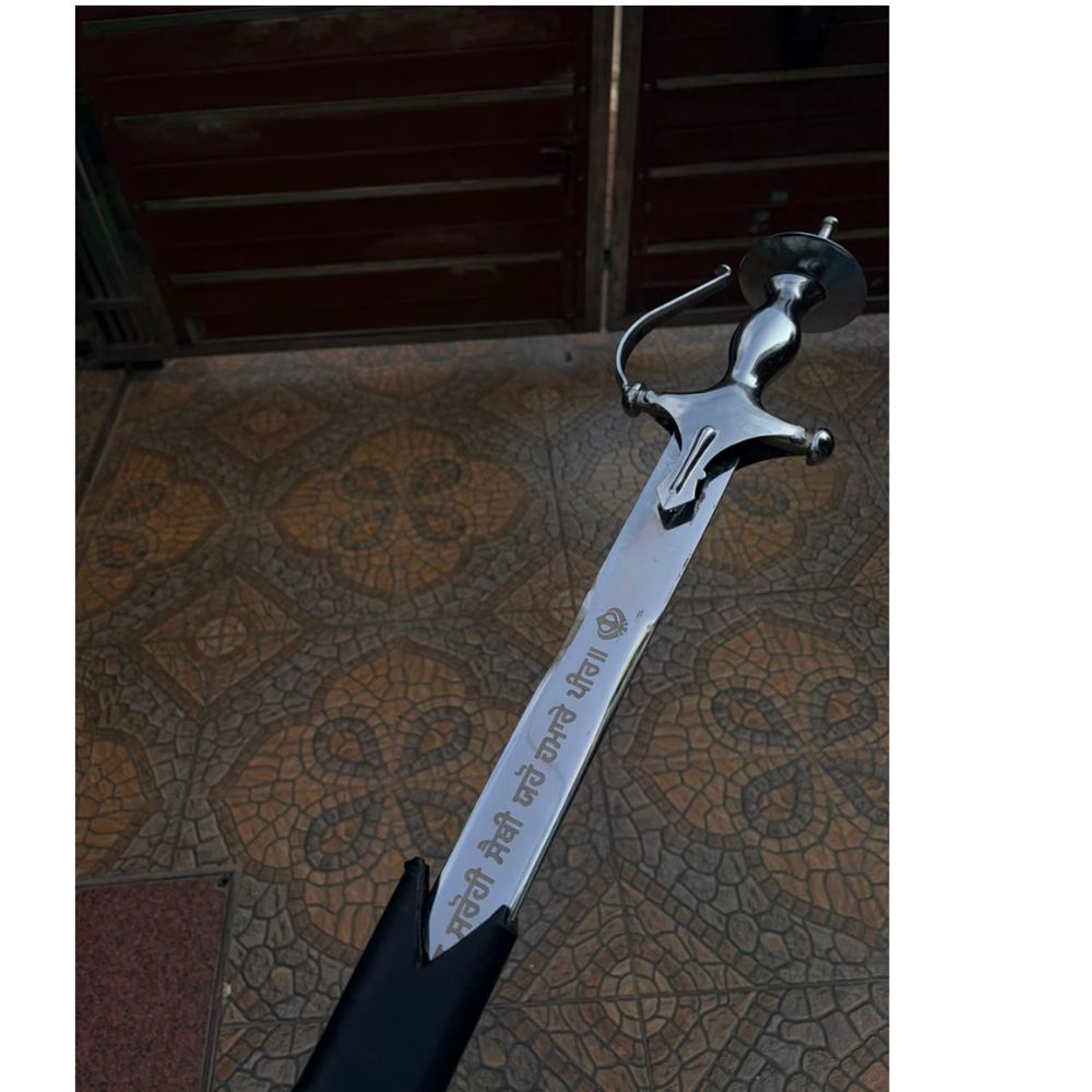Punjabi Traditional Khanda resting in black leather sheath, hilt visible