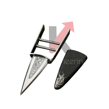 Handcrafted Rajput Katar dagger placed on a wooden surface