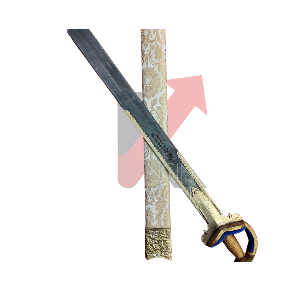 Close-up of the handcrafted brass handle on an Indian Khanda sword