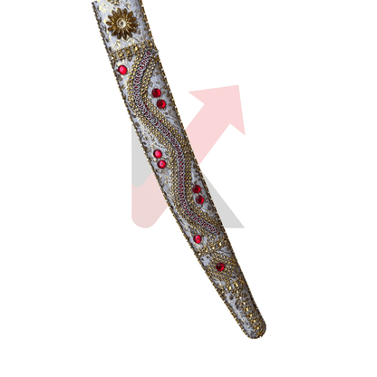 Decorative sword with gold and red embellishments on a white background