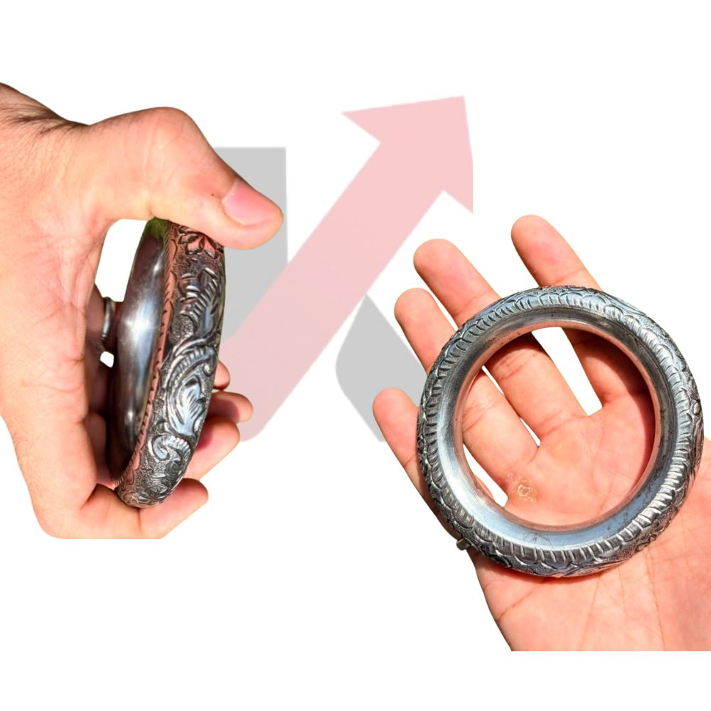 Hand carved sarabloh kada worn on wrist with other bracelets